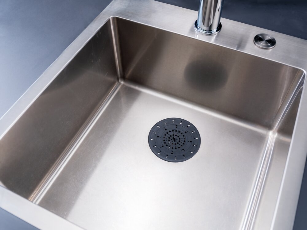 Crépine d'écoulement en silicone Mod. Sava  pour les écoulements d'évier et de lavabo courants