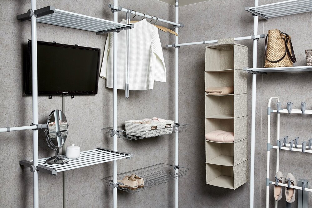 Système de penderie télescopique Hercules Duo  avec 3 tringles à vêtements et 2 paniers de rangement